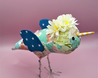 Whimsical paper collage small bird 3D sculpture with wire legs