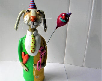 Whimsical circus bunny with a clown balloon