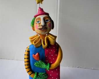 Whimsical clown clay sculpture