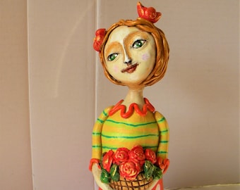 Flower girl clay sculpture