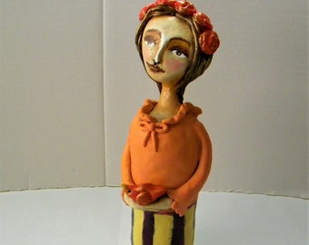 Whimsical Clay Girl Sculpture with Bird: Acrylic Painted Figurine