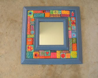 Upcycled square mirror with handmade polymer clay mosaics, a colorful home accessory