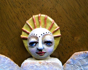 Angel sculpture wall art with a positive affirmation