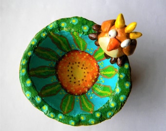 Whimsical plaster and clay bowl