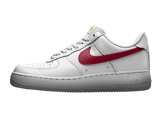 white nike shoe with red swoosh