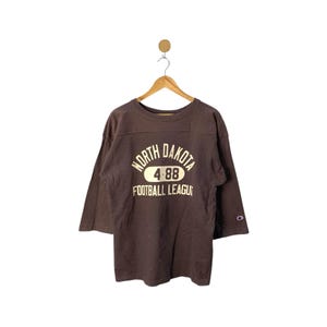 Sudadera vintage Champion de los años 80, de tejido inverso, de la Universidad de Dakota del Norte, talla mediana.