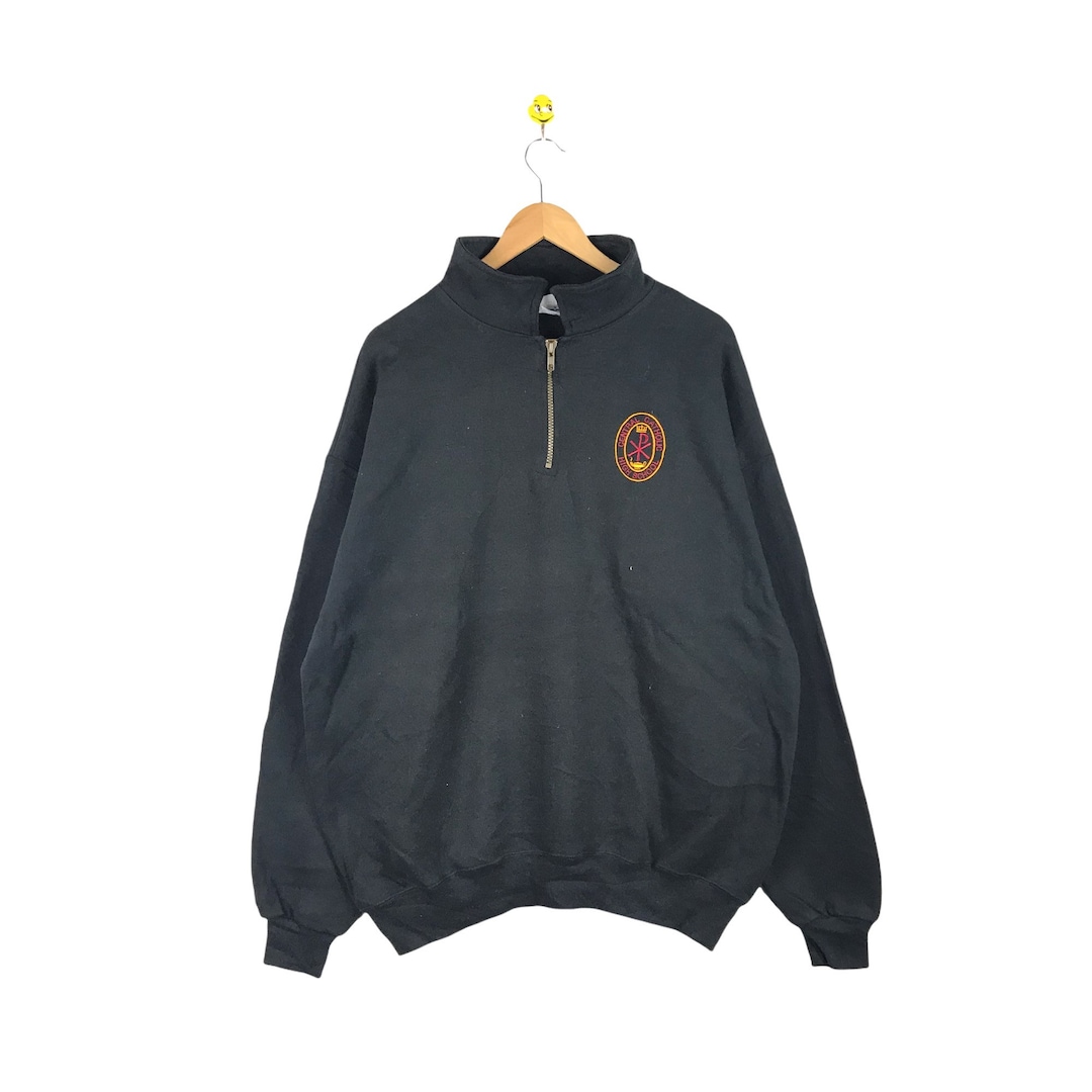 Felpa vintage della scuola superiore cattolica centrale mezza