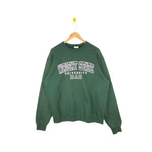 May include: Green sweatshirt with the text "Wright State University Dad" in white and navy blue lettering.