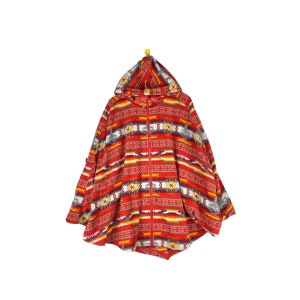 May include: Red hooded fleece jacket with a geometric pattern in shades of orange, yellow, white, and gray. The jacket has a zipper closure and a long, flowing style.