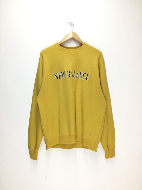 new balance yellow sweater