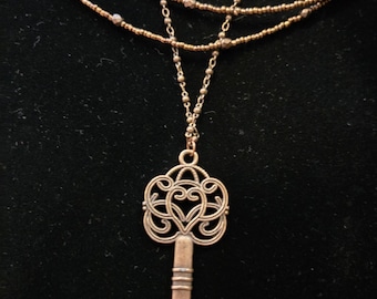 Elegant Key Pendant on a three strand Necklace