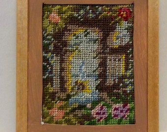 Dollhouse miniature accessory in twelfth scale or 1:12 scale. Petit point stitched garden scene, matted and framed. Item #N294.