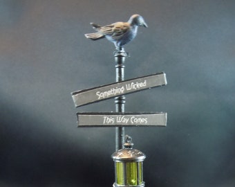 Dollhouse miniature accessory/furniture in twelfth scale or 1:12 scale. Halloween sign post "Something wicked comes this way".   Item #N593.