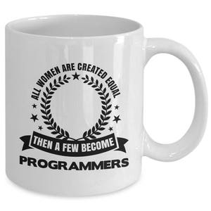 May include: White ceramic coffee mug with a black graphic that reads "All women are created equal then a few become programmers".