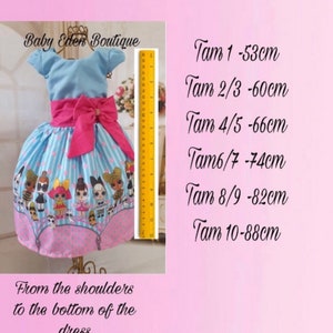 May include: A blue and pink dress with a pink bow and a print of cartoon characters. The dress is measured in centimeters from the shoulder to the bottom of the dress. The measurements are: 1 - 53cm, 2/3 - 60cm, 4/5 - 66cm, 6/7 - 74cm, 8/9 - 82cm, 10 - 88cm.