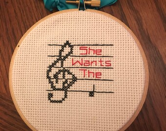 She wants the D cross stitch finished hoop