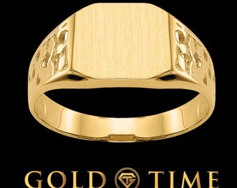 May include: A yellow gold signet ring featuring a flat, brushed rectangular top surface and textured, nugget-style sides. The ring is displayed above the text GOLD TIME FINE JEWELRY & WATCHES, which is printed in gold lettering on a black background.