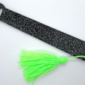 Paw bookmarks with lime green tassles