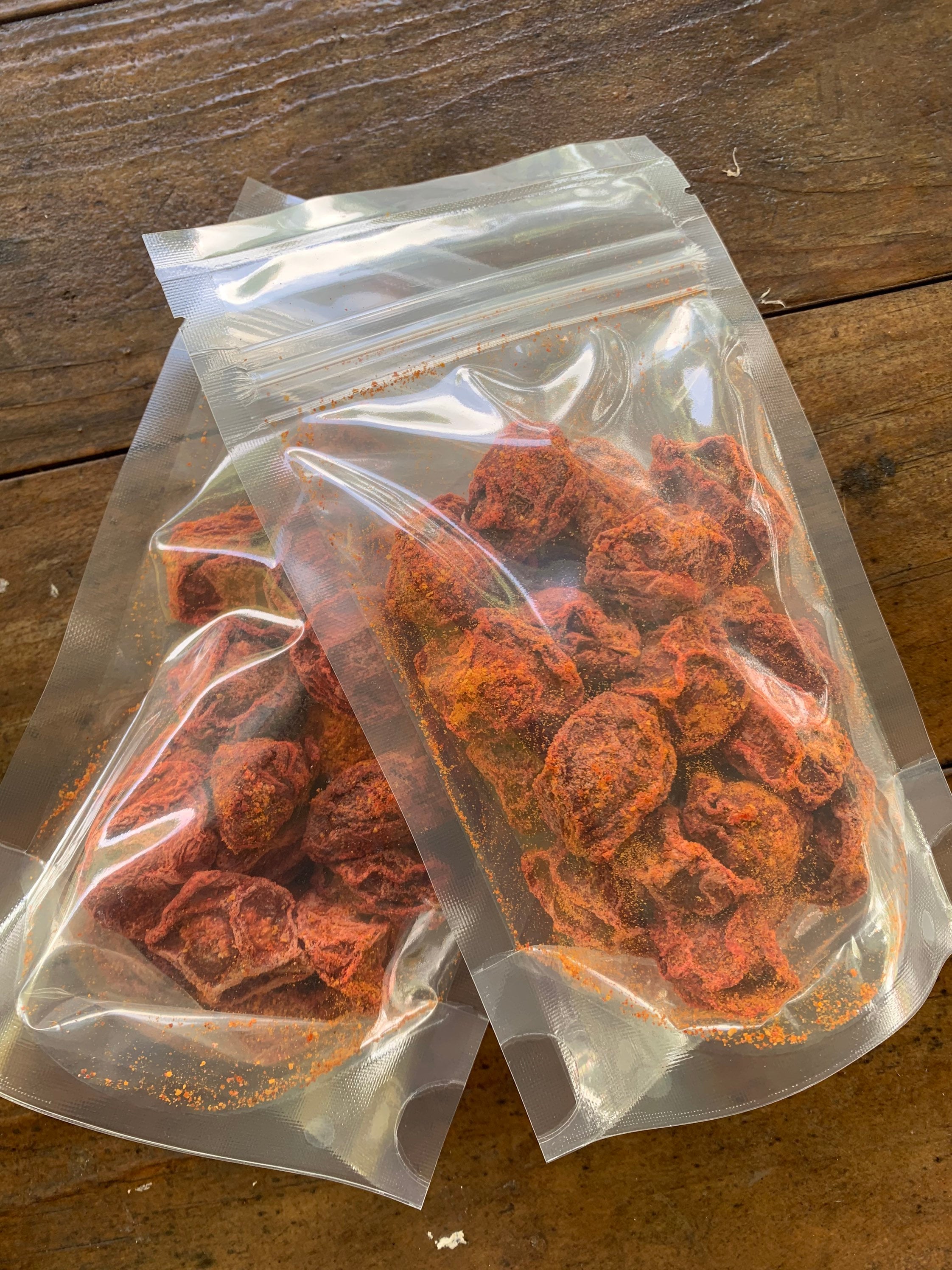 Spicy sweet and sour kiamoy champuy with Guam Boonie Pepper powder.  Add a teaspoon of vinegar or tabasco, mix in bag and enjoy!  2 ounces.