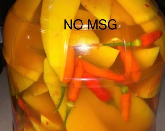 4lbs Mango pickled with real Guam Boonie Peppers sweet and spicy.