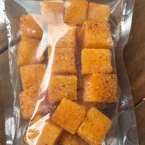 Pika Mango Gummies.  5-ounce pouch.  Sweet, chewy and very spicy.  Spiced with our very own donne sali seasoning powder.