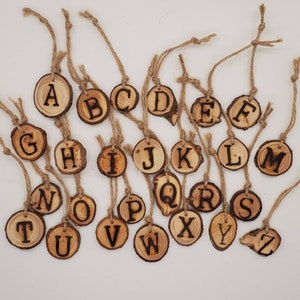 Woodburn letter ornaments live bark wood slice ornament