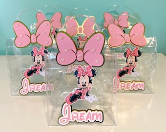 Bolsas de recuerdo para fiestas de Minnie Mouse, con lazo rosa.