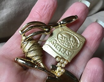Signed and Faux Currency Rolls Royce Grill AJC Rich and Famous Matte and Shiny Goldtone Pin with Money Bag Rhinestones