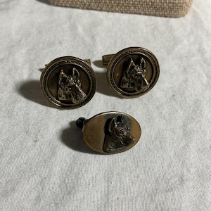 May include: A set of three ceramic nesting bowls in shades of blue, green, and white. The bowls feature a speckled glaze and a simple, modern design. The largest bowl measures approximately 6 inches in diameter.