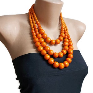 Three-row wooden necklace Statement bib necklace Eco friendly necklace Chunky beaded necklace Large bead necklace from wood for women Orange