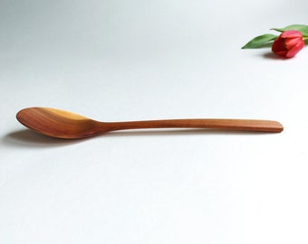 Elegant traditional handcrafted HQ plum wood table spoon with thin handle. Smooth and gorgeus.