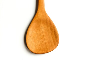 Cherry wood cooking spoon, Hang and watch or cook and touch. For right handed chefs.