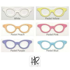 May include: Six pairs of eyeglasses in pastel shades: white, pastel yellow, pastel peach, pastel pink, pastel purple, and pastel blue. Each pair has a round frame. Text below each pair reads "White", "Pastel Yellow", "Pastel Peach", "Pastel Pink", "Pastel Purple", and "Pastel Blue".