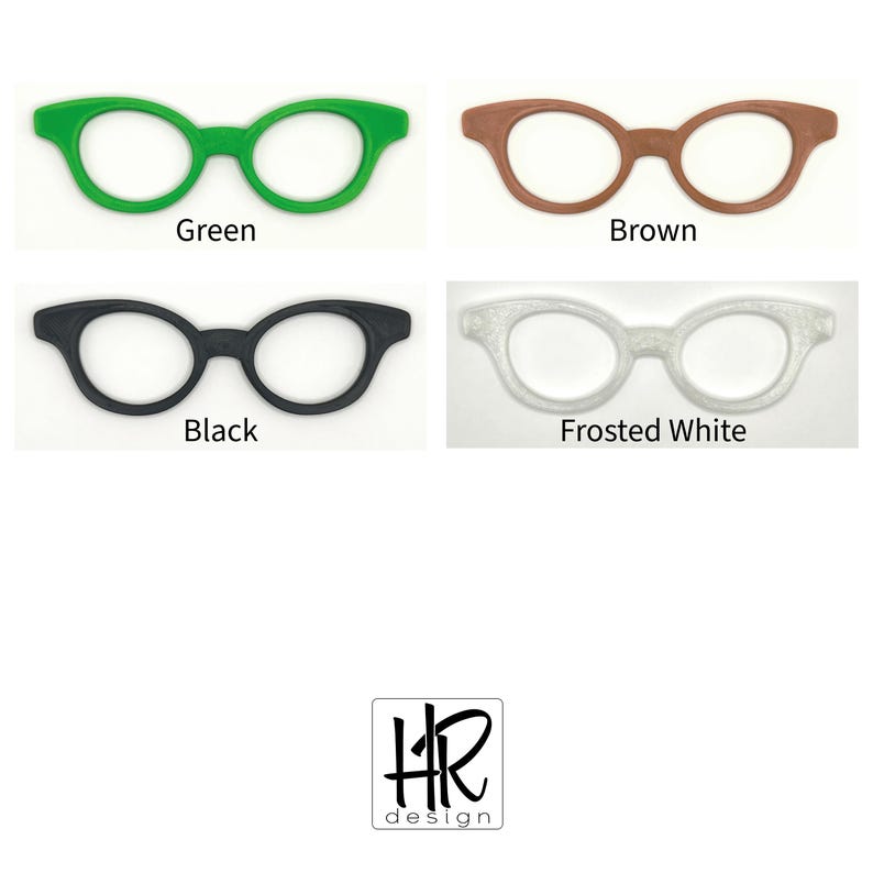 May include: Four pairs of spectacles in various colours: green, brown, black, and frosted white. Each pair has a classic, rounded frame design. The image includes the text "Green", "Brown", "Black", and "Frosted White" below each pair.