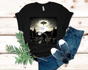 Bigfoot UFO Tshirt - Funny T-shirt for UFO and Bigfoot Fans - Unisex Jersey Short Sleeve Tee, Cryptozoology Graphic Tee, Unique Holiday Gift