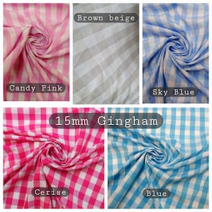 May include: A collection of gingham fabric swatches in various colors, including candy pink, brown beige, sky blue, cerise, and blue. The text "15mm Gingham" is displayed across the image, indicating the pattern size.