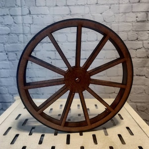 15 inch laser cut wheels, wagon wheels, canon wheels, bike wheels, motorcycle wheels, mechanical wheels