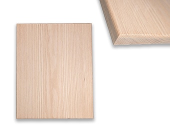 May include: Two pieces of light wood with a natural grain pattern. The wood is smooth and has a light brown color.