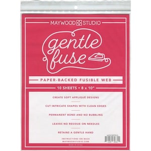 May include: A package of Maywood Studio gentle fuse paper-backed fusible web. The package is pink and white and says "gentle fuse" in a white script font. The package says "10 sheets 8 x 10" and lists features like "create soft appliqué designs" and "cut intricate shapes with clean edges".