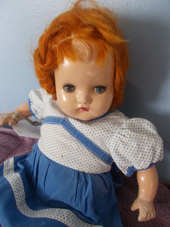 red haired baby doll