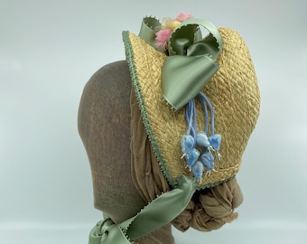 Beige hoefijzerhoed voor dames, jaren 1880 met groen lint en modevakbloemen, historische reproductie