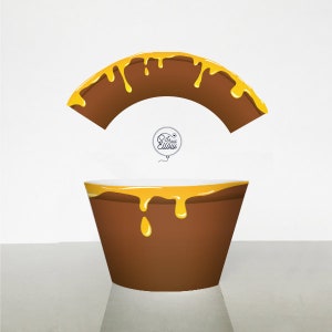 Könnte beinhalten: Ein brauner Pappbecher mit gelbem Honig, der an der Seite heruntertropft. Der Becher ist mit einem braunen und gelben Papierrand versehen.