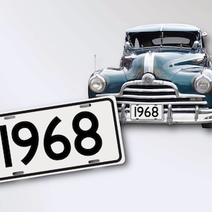 May include: A vintage blue car with a white license plate that reads "1968".