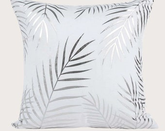 Coussin déhoussable blanc imprimé feuilles argentées