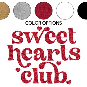 May include: Red glitter text on a white background that reads "sweethearts club".  There are five color options for the text: gold, silver, red, white, and black.