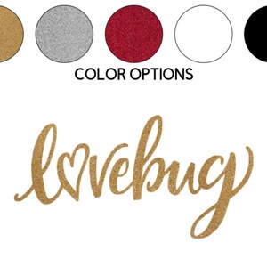 May include: Gold glitter lovebug design with a heart in the word love. The design is available in a variety of colors, including gold, silver, red, white, and black.