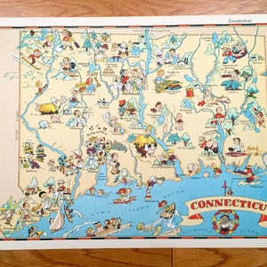 May include: A vintage illustrated map of Connecticut featuring cartoon characters and landmarks. The map is on a white background with a red, white and blue border. The text "CONNECTICUT" is in a red banner at the bottom of the map.