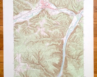 May include: A vintage topographic map of the Youghiogheny River in Pennsylvania. The map shows the river winding through a mountainous region with detailed contour lines and elevation markings. The map also includes the names of various towns, rivers, and other geographical features.