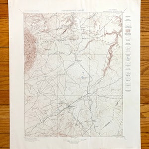 May include: A vintage topographic map of the Colorado area, showing the location of the town of Walsenburg. The map is printed in black and white with brown contour lines and blue water features. The map is titled "Topographic Sheet" and includes a legend.
