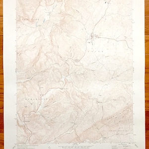 May include: A vintage topographic map of the Union, West Virginia area. The map shows the location of Union, Springfield, and Sweet Springs. The map is printed on a white background with brown lines and text.
